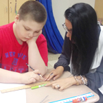 Special needs student being taught functional math