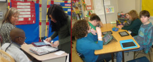 Beverly Holborow of alpha school working with special education students Ocean County
