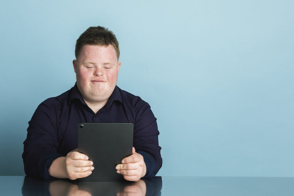 Employment Options for Those with Autism looking at tablet