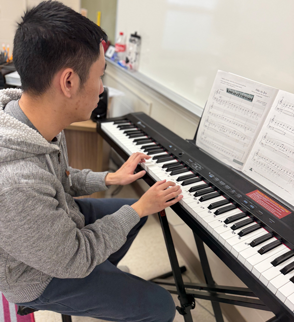 alpha school student on piano in music class 